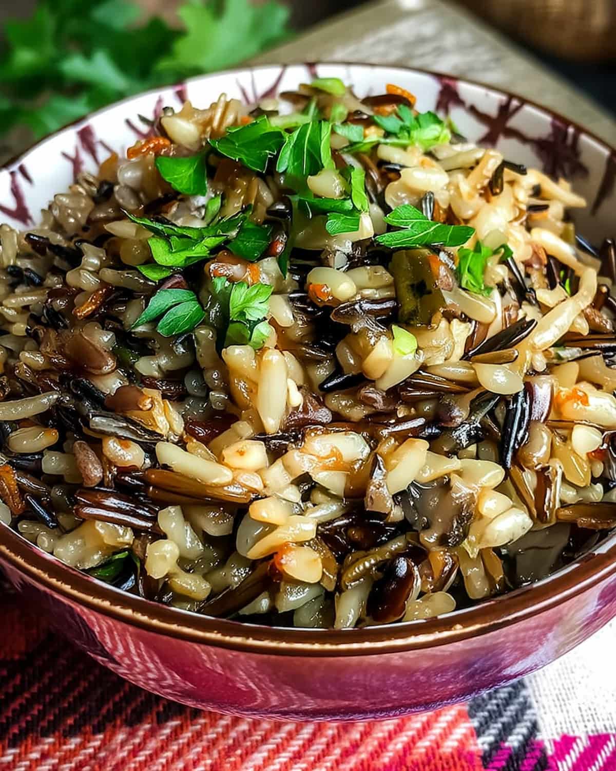 Instant Pot wild rice pilaf, mixed with vegetables and topped with fresh parsley.