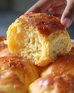 Instant Pot Sweet Potato Bread rolls with golden crust, soft fluffy interior, and a tender.